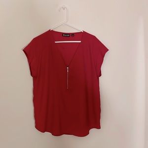 Lady in red, cute blouse with zip front feature.  Sleeves are flattering and fun